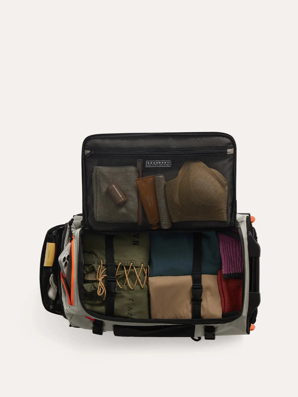 Mochila de Viagem com Rodas 43 L Bags Mart Cor Cinza — interior com objetos de demonstração